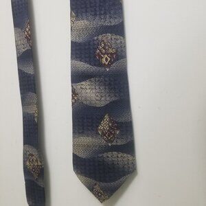 Vintage blue E. M. Rigby tie with wavy and diamond patterns